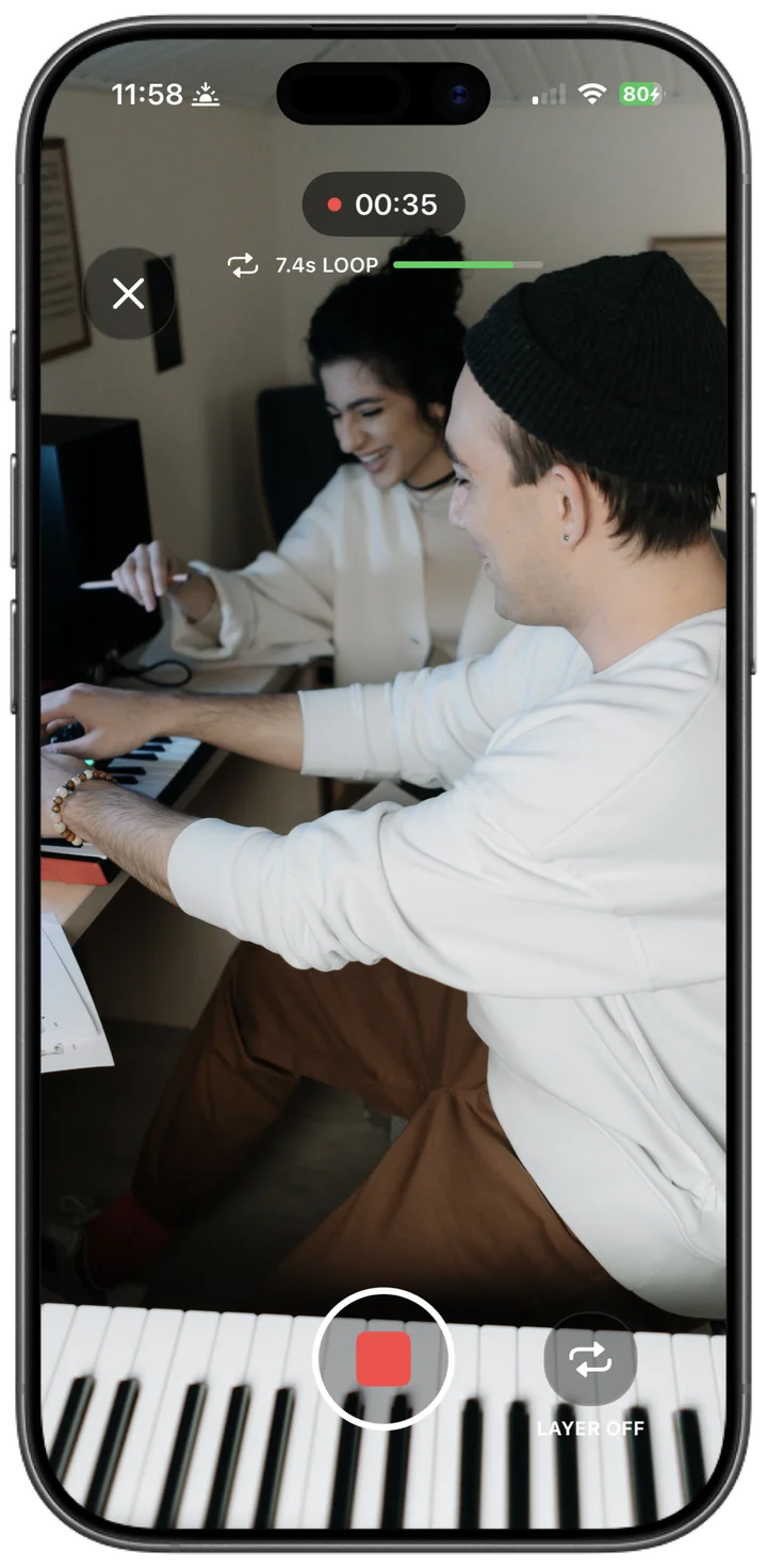 Two musicians recording a live keyboard loop in Ampfold